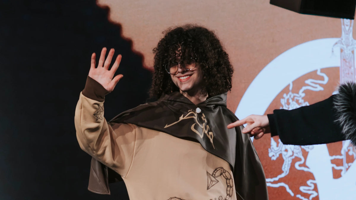Scorpion-embroidered hooded piece under the house mark at New York Fashion Week